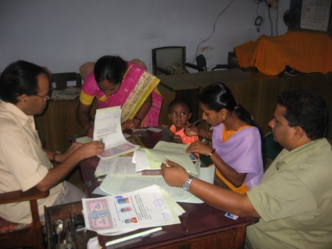 Figure 3	Mrs. Sujata, the landowner, signing the land transfer deed in the name of the villagers