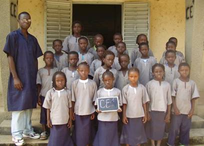 Emile Sagna, one of the teacher with his pupils Emile Sagna, one of the teacher with his pupils