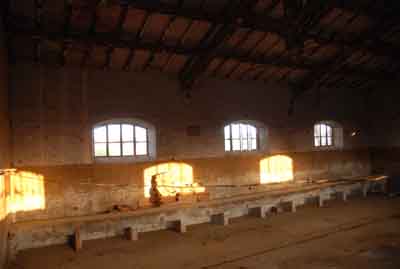 The cowshed of the building before the start of restructuration